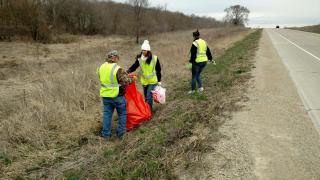 Volunteers cleaning the roadside